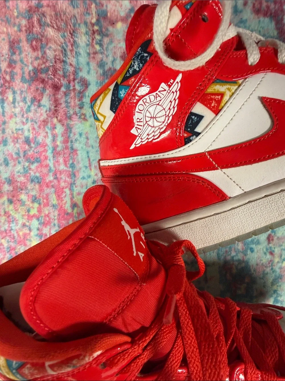 Jordan men’s High Top Sneakers in Red and White with Multicolor Collar